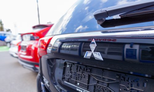 Nuremberg / Germany - April 7, 2019: Mitsubishi logo on a Mitsubishi car at a car dealer. Mitsubishi Motors Corporation is a Japanese multinational automotive manufacturer headquartered in Japan.